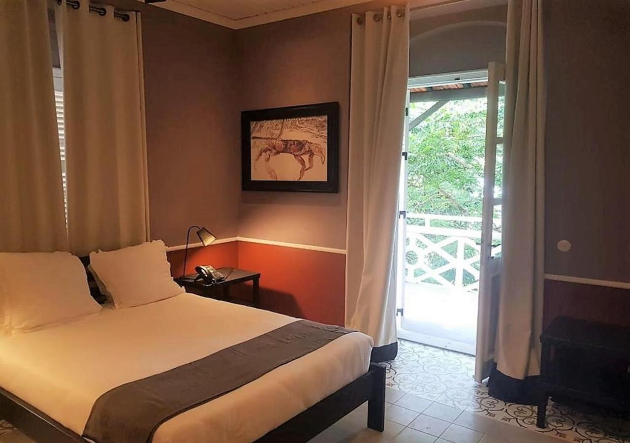 Roca Sundy - Principe Collection Pension Santo António Kamer foto
